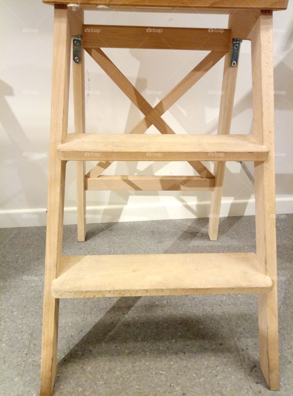Low wooden ladder and stool