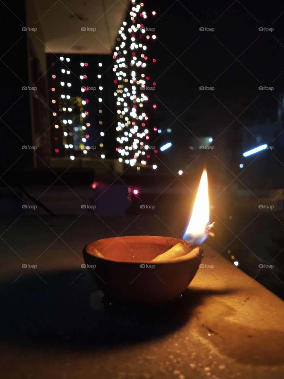 Spiritual people will like this shot a lot more because this shot depicts this lightening Diya full of positive energy with a very beautiful background scenery.📸✨