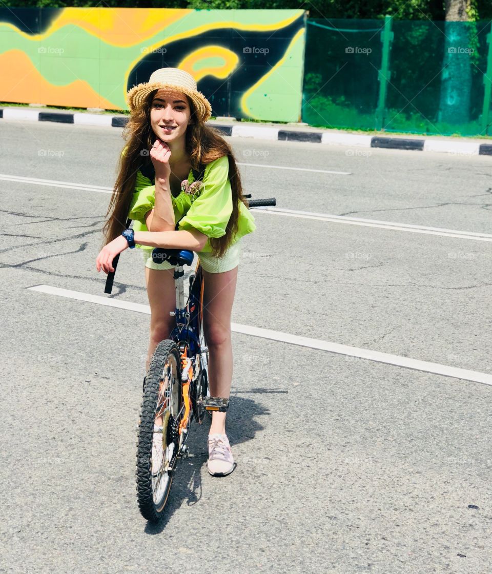 Cycling is my hobby! Bright summer green photo on the road!