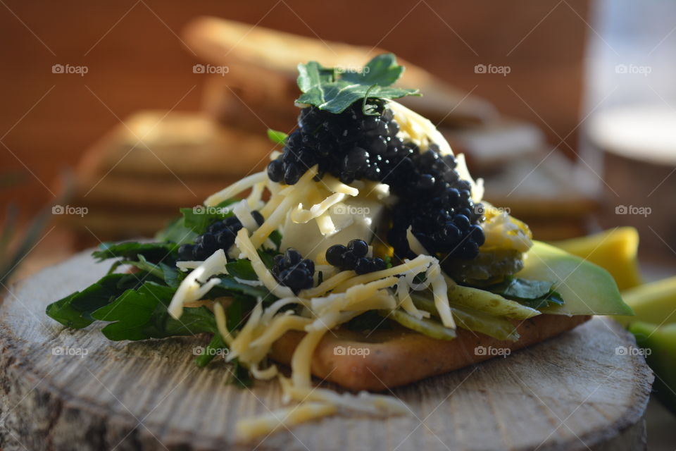 Preparation of food on tree stump