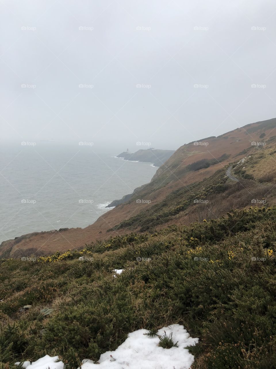 Irish cliffs overlooking the ominous sea
