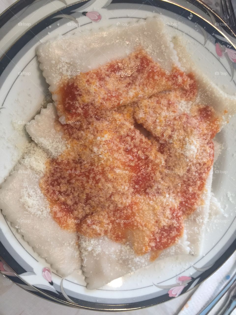 Cheese Filled homemade Italian Raviolis with Red Tomato Sauce
