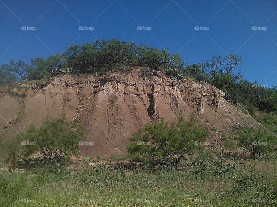 mud slide. when it rains the dirt gives way and this cliff blocks the road
