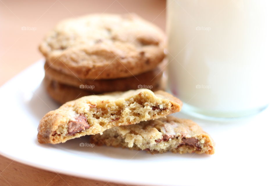 Milk and cookies. Bottle of milk and choc chip cookies