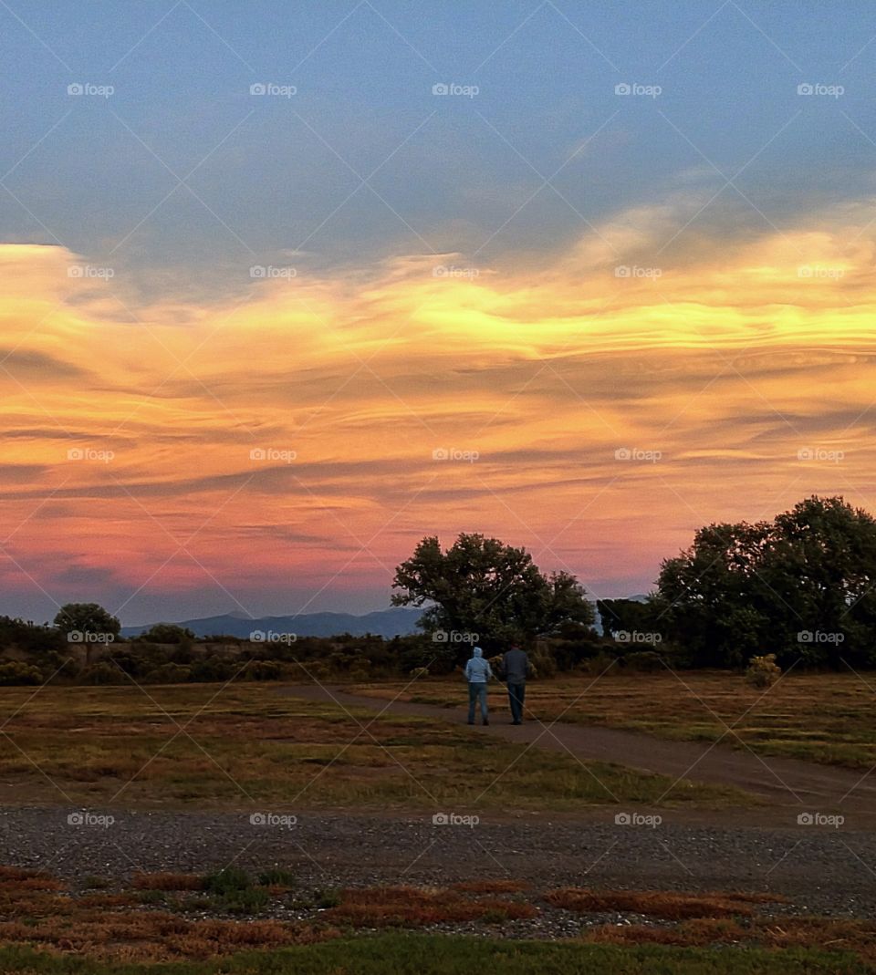 Walking towards the sunset