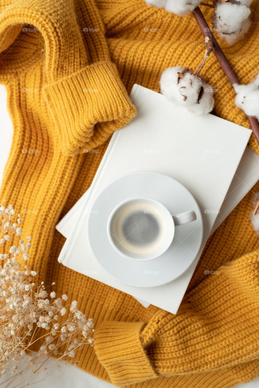 autumn vibes with coffee and yellow sweater