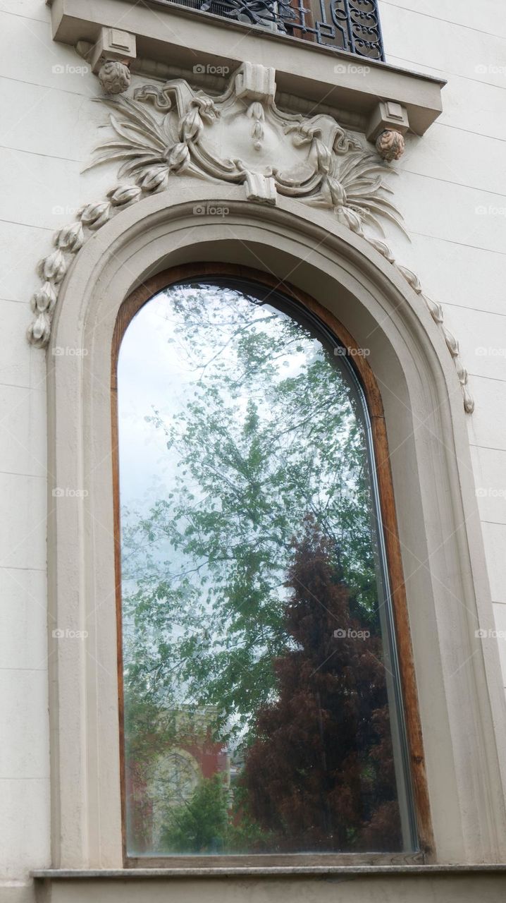 Arcade window reflection