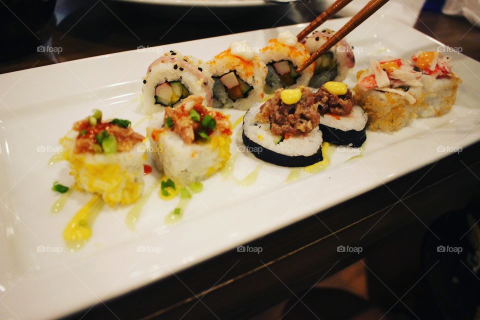 This is a picture of the sushi bundle that was served to us during my anniversary celebration in a Japanese restaurant. Me and my girlfriend found these sushis very tasty.