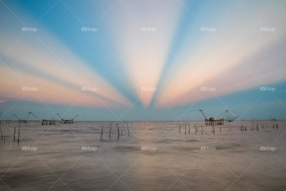 Wondefful sunset light moment above big fish trap in Thailand