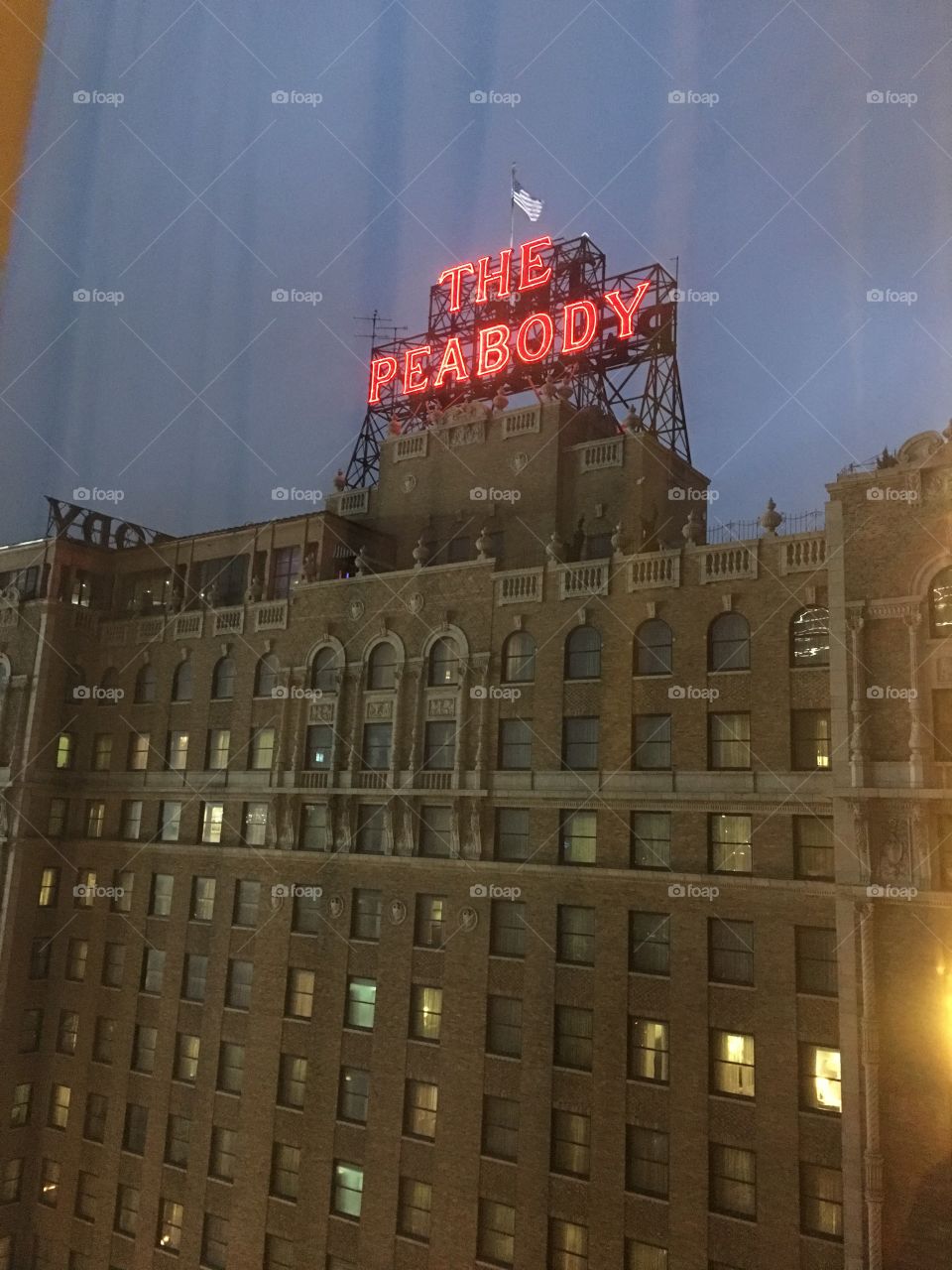 View of the Peabody hotel in Memphis, TN on a rainy evening