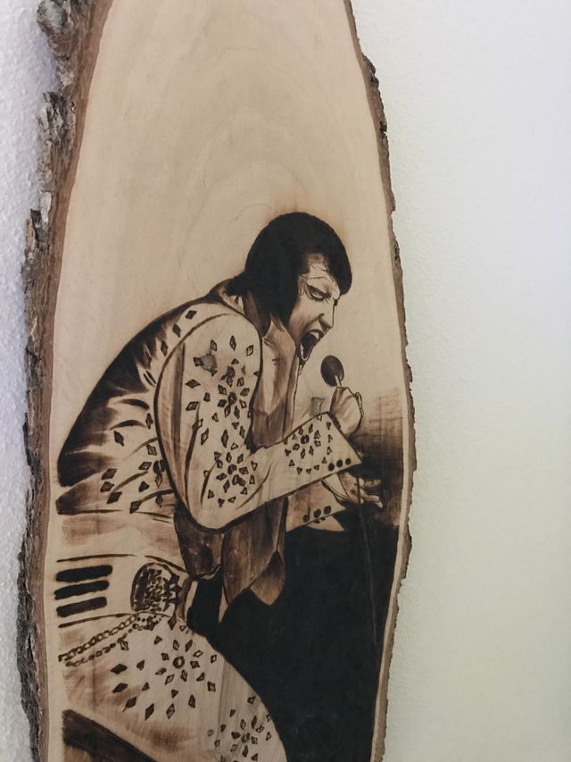 A hand carving of Elvis