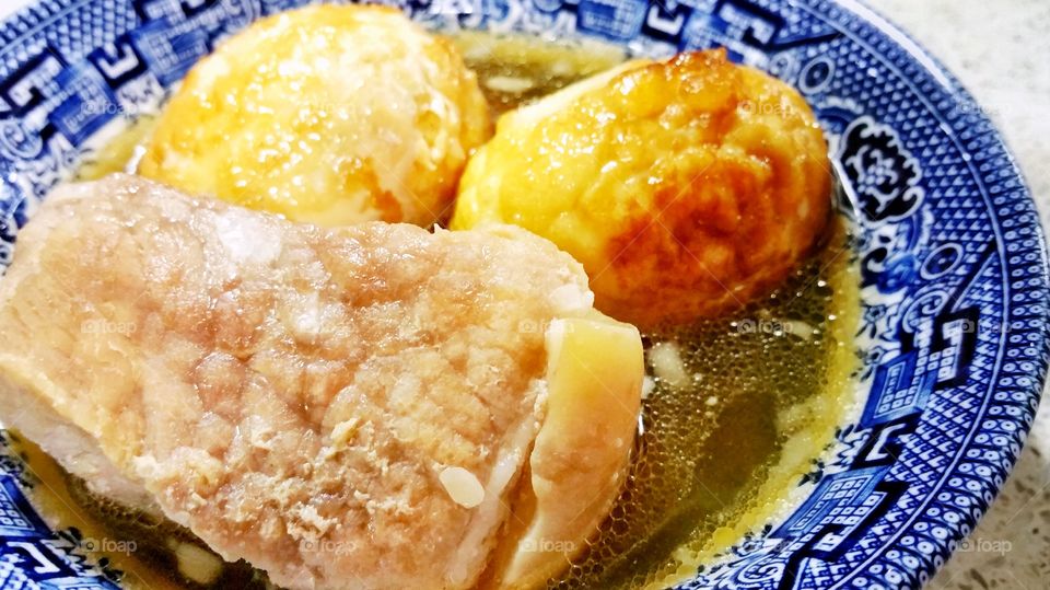 Pork belly braised in coconut juice with fried eggs.  A homemade dish to what is a very popular Vietnamese cuisine. (Thit Heo Kho)