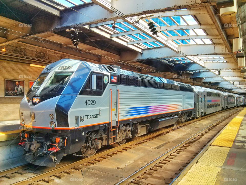 New Jersey Transit Locomotive. Locomotive and its train at Newark Penn Station
