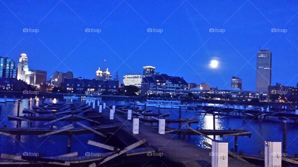 Buffalo NY city skyline at night taken from Erie Basin marina.