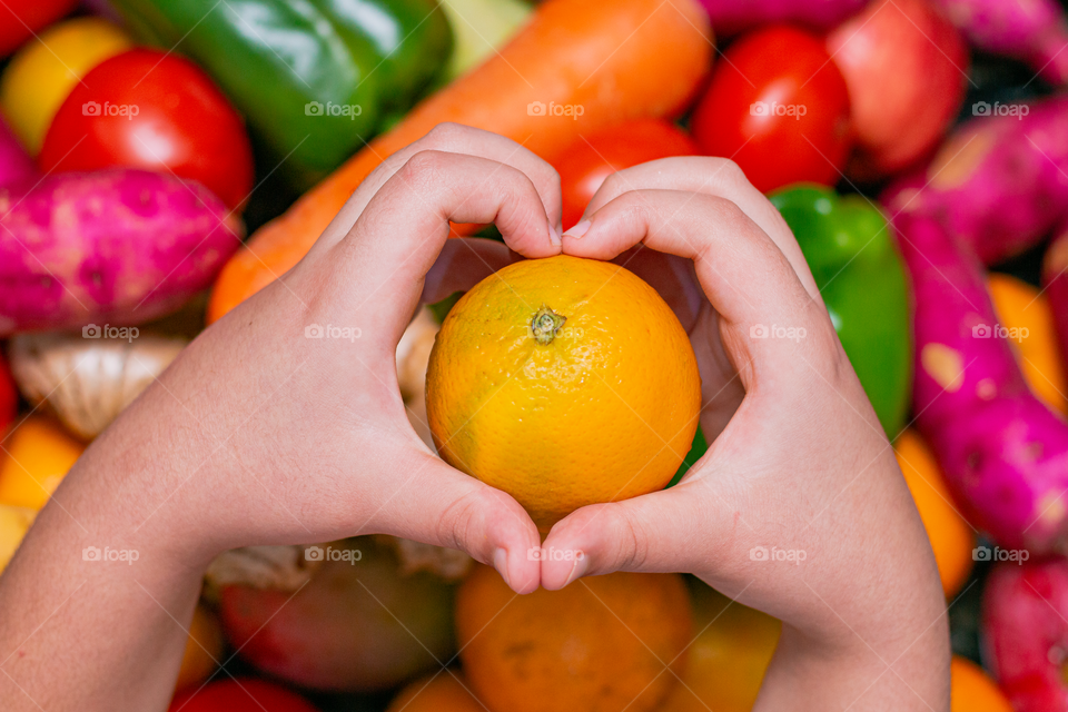 Popular and beloved foods in Brazil: orange, tomato, peppers, sweet potatoes, baroa potato, chayote, apple, passion fruit, pink mango