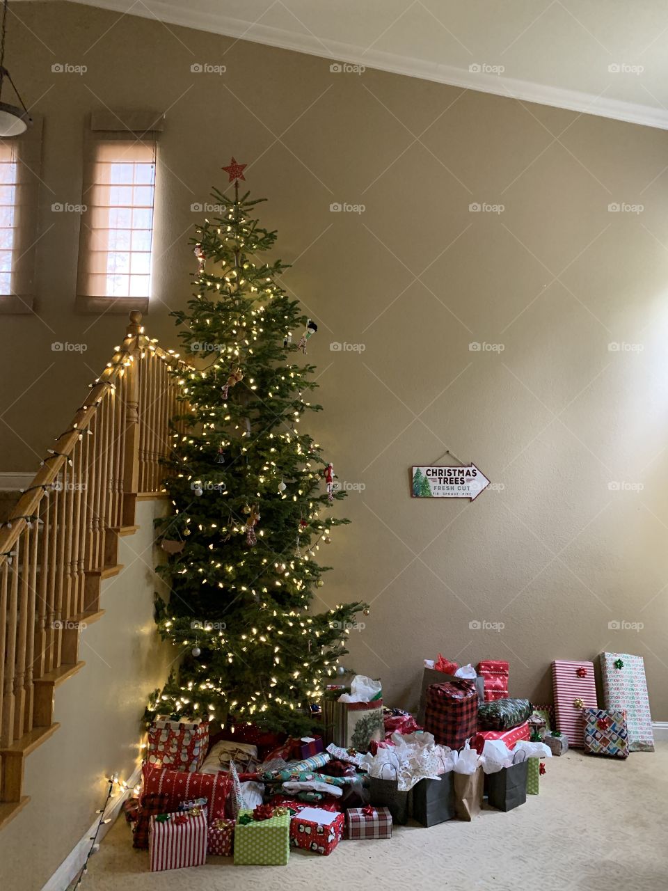 Christmas gifts surrounding the Christmas tree 