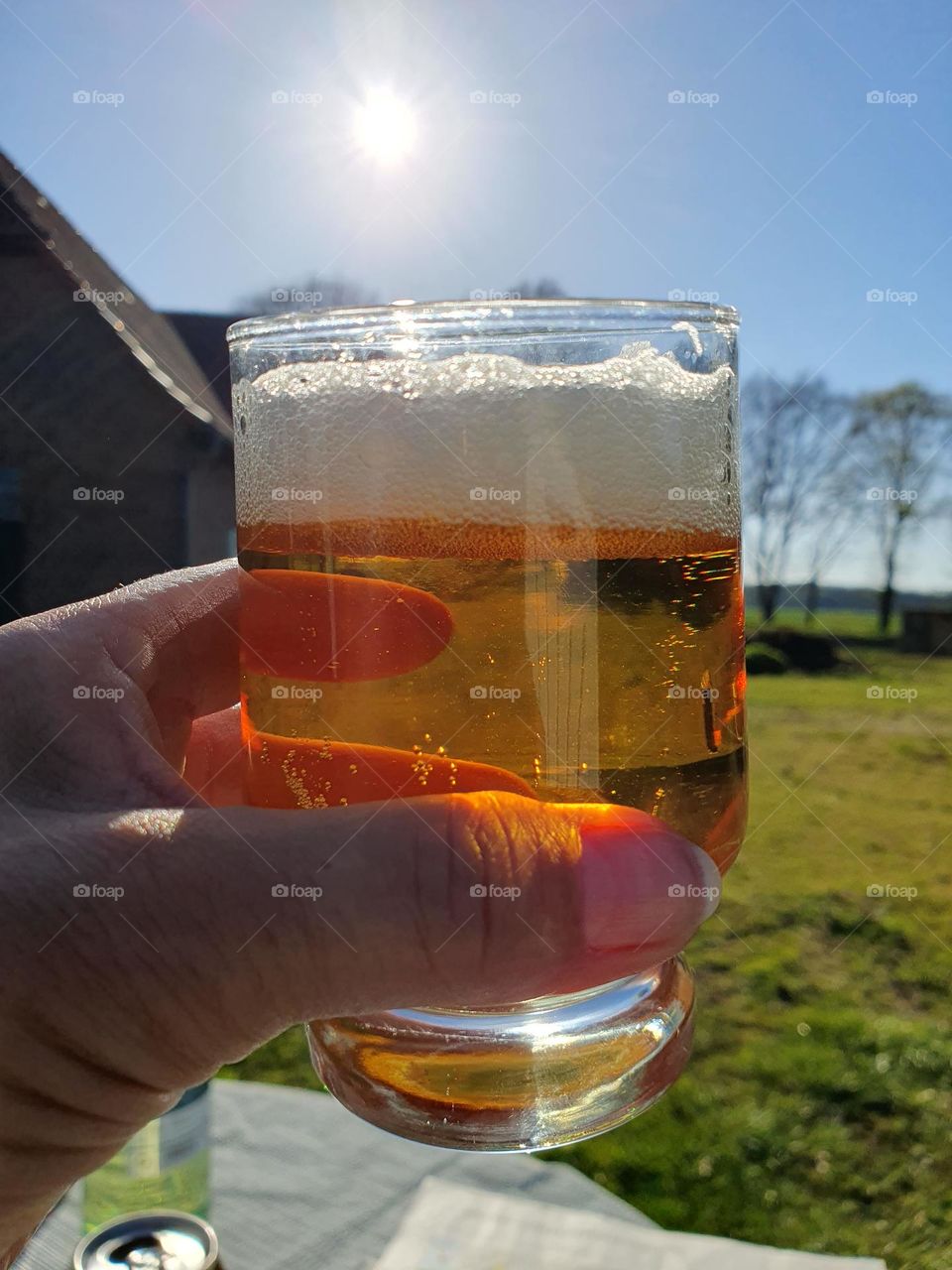 delicious beer ar sunset in a rural setting