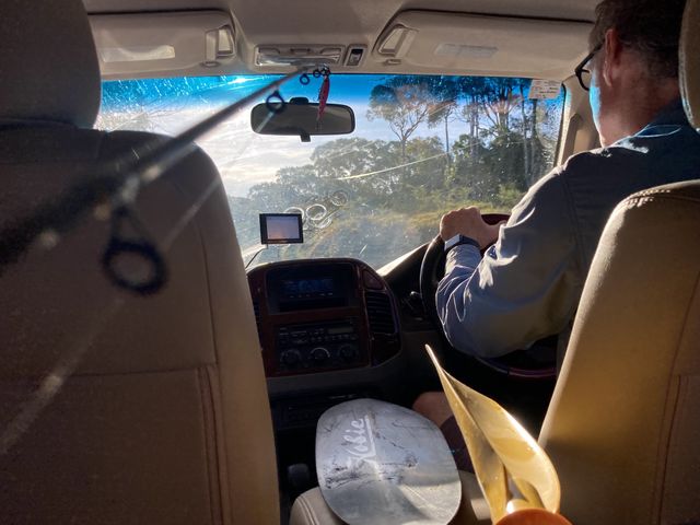 On the road: backseat perspective preparing for a kayaking trip on the Australian coast,