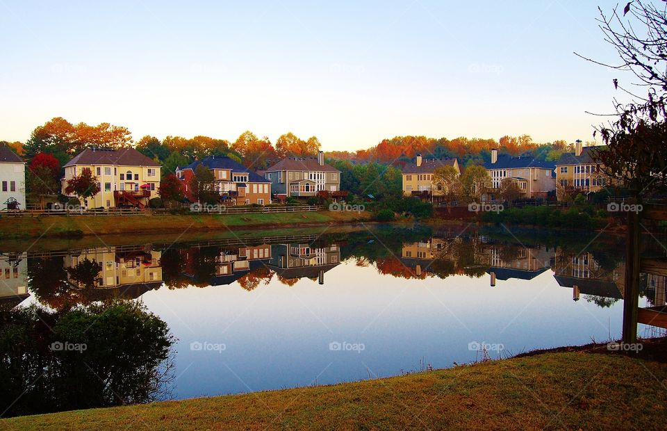 Houses reflected on a lake