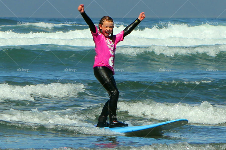 Staying in shape means surfing! We go every year for a family trip and the girls surf, we play in the waves & on the beach and enjoy being together!  This is my youngest doing her victory cheer for getting up on her board!🏄‍♀️