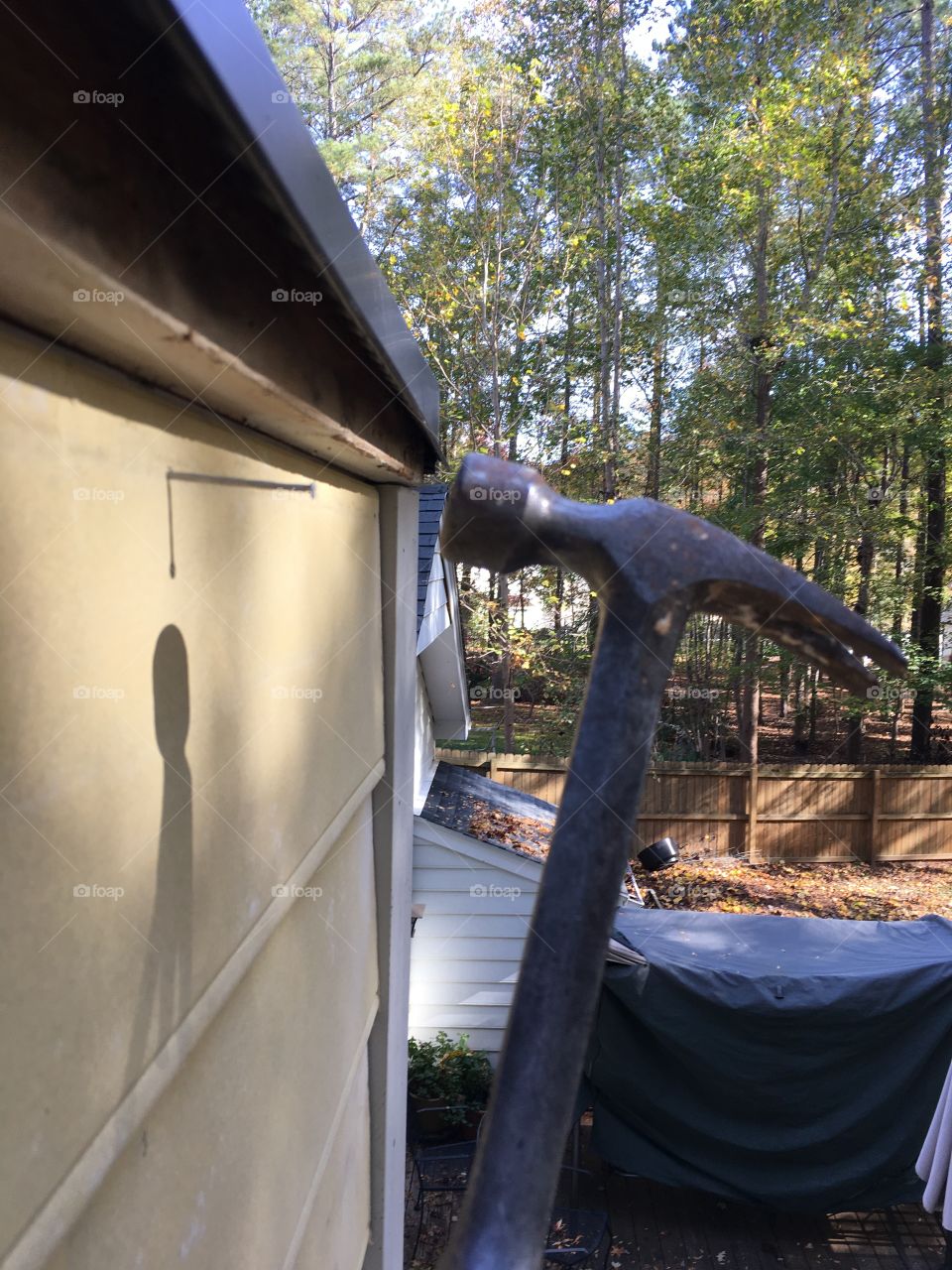 Last piece of siding (on this side of the chimney)