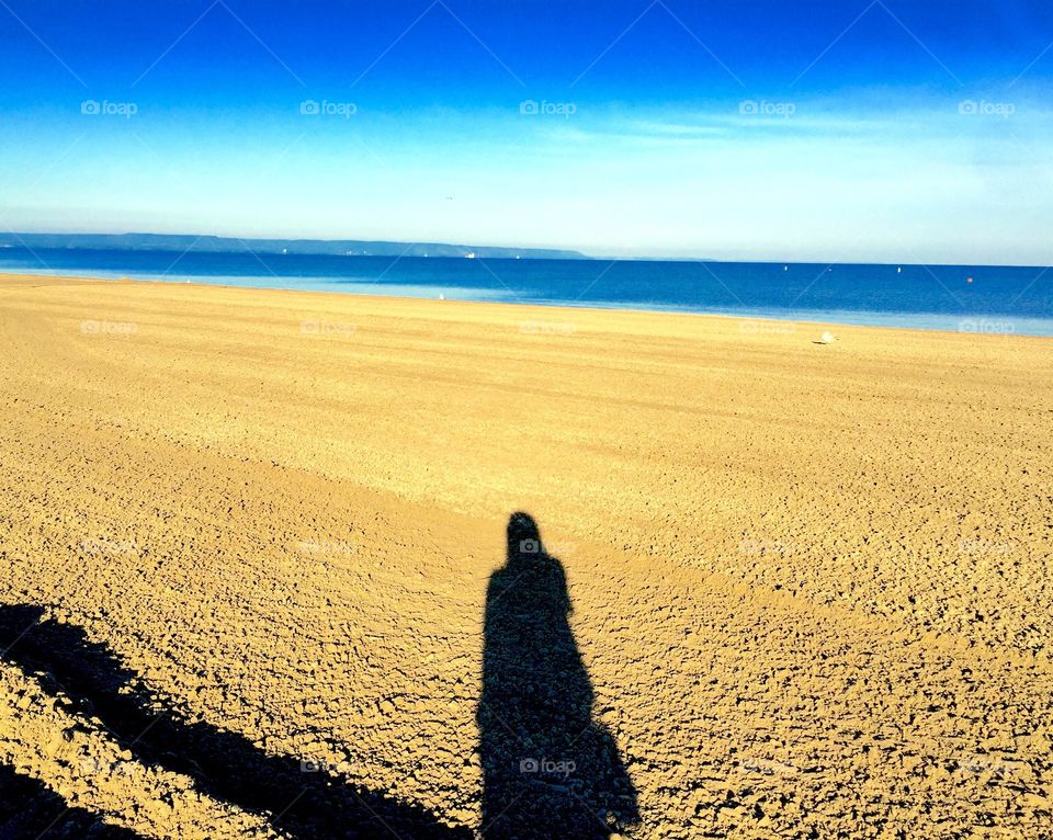 This is my shadow when I went to Wasaga Beach 