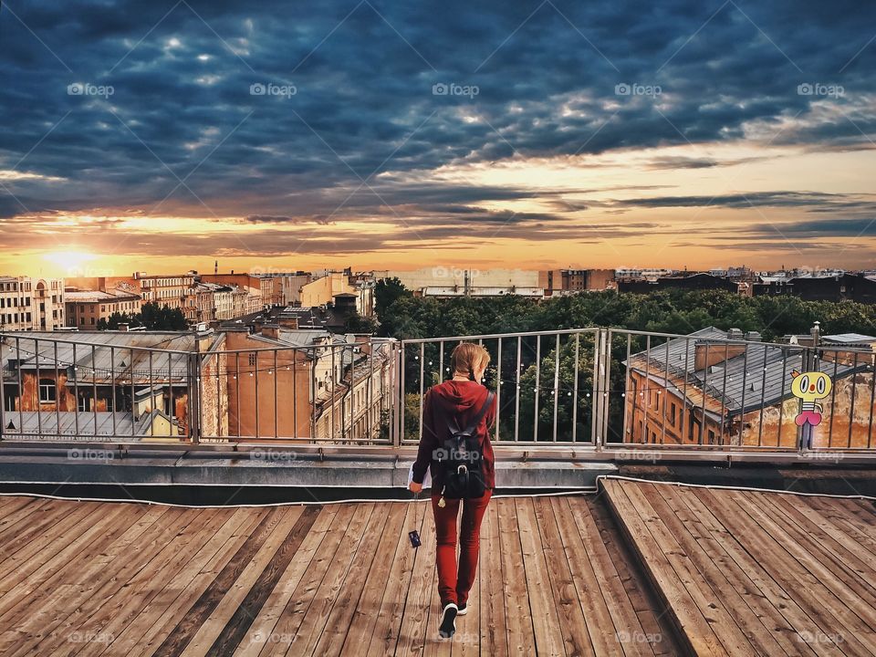 The Floors. In this photo a girl, walking on the roof of Leningrad 