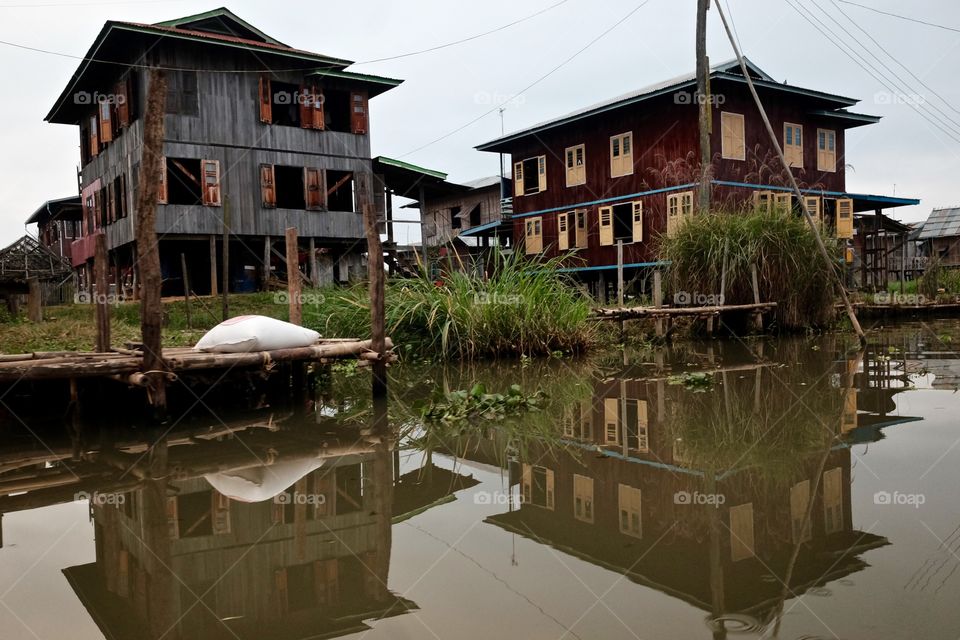 Stilt houses on water in myanmar