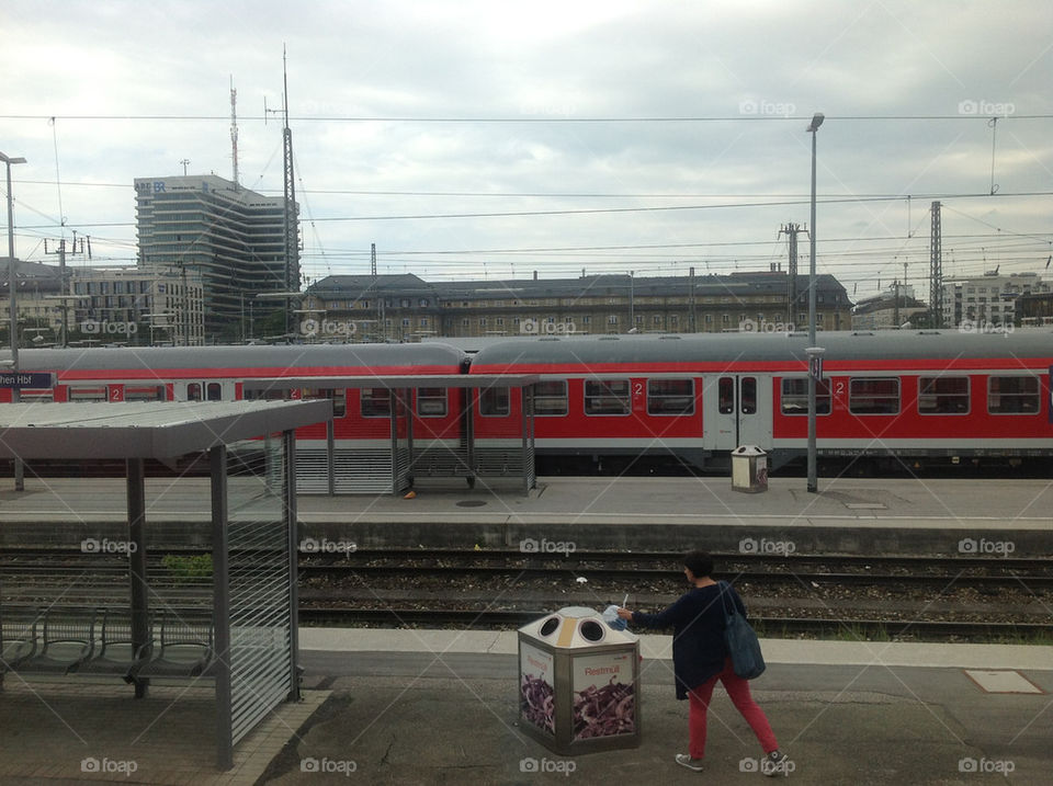 woman train tracks trash by lexlebeur