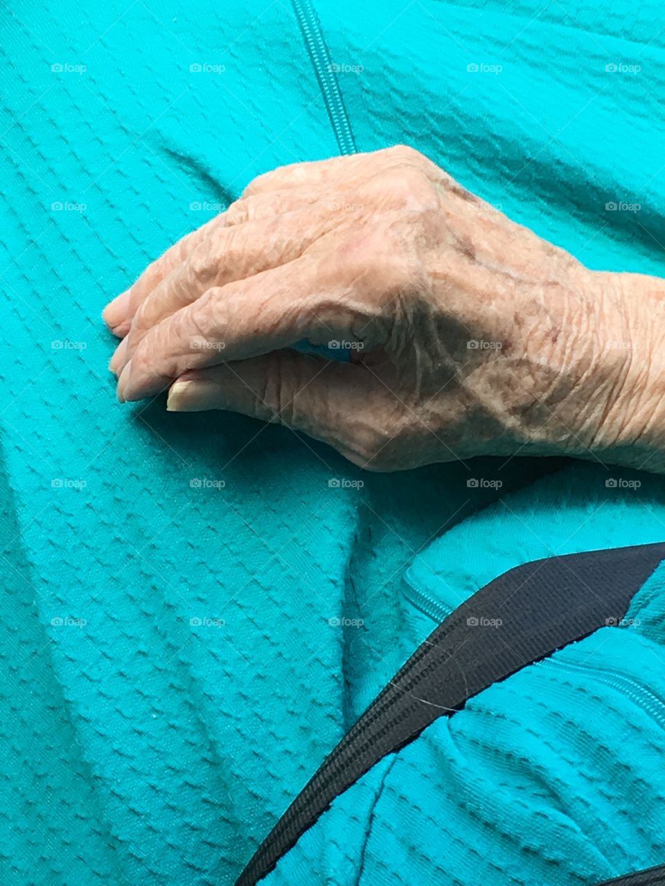 This 90 year old hand has worked through many of days. 