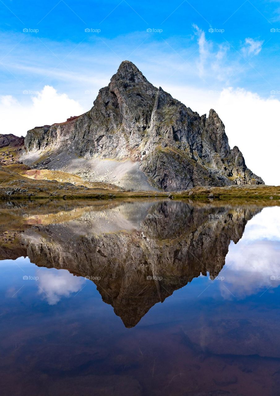 mirror effect on a crystal clear lake