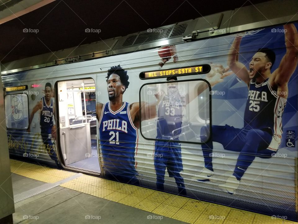 El train, 76ers, Joel Embid, Ben Simmons,  basketball, all stops to 69th street, platform, train