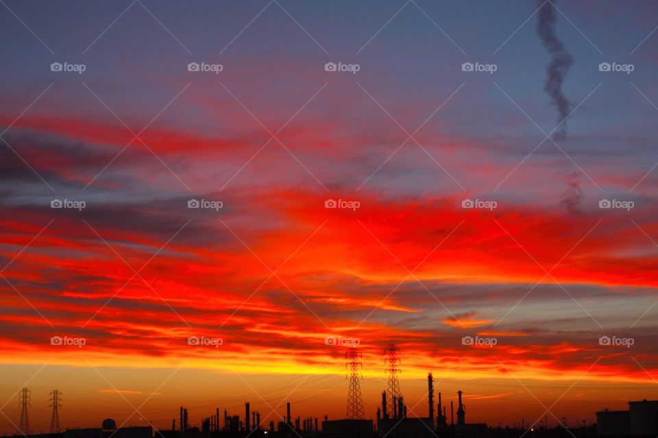 Silhouette of industry at sunset