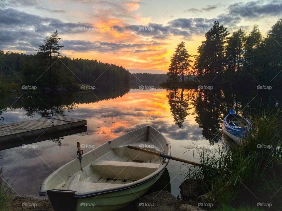 Reflection of sunset in lake