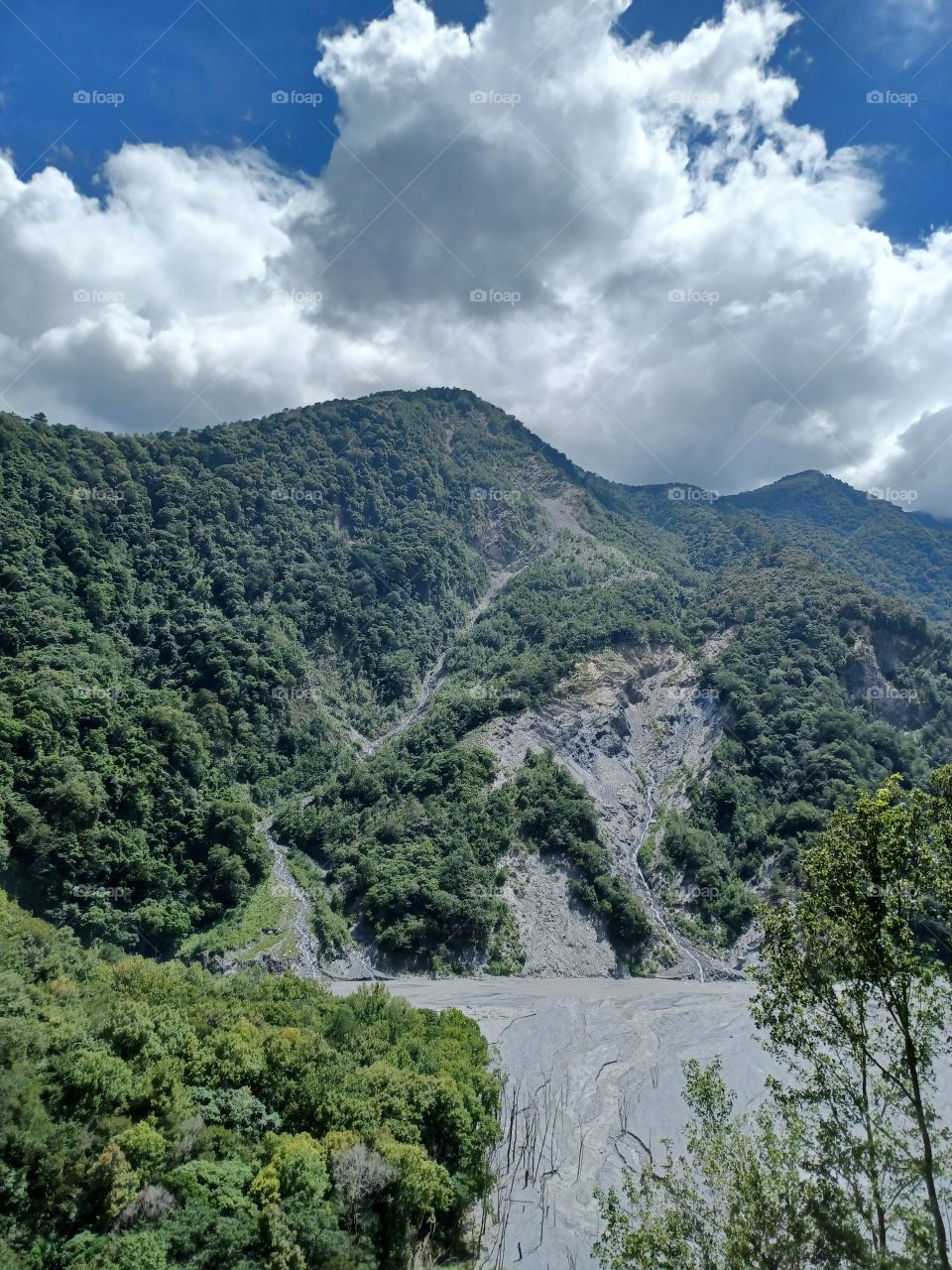 A side of the ridge in a cloudy day.