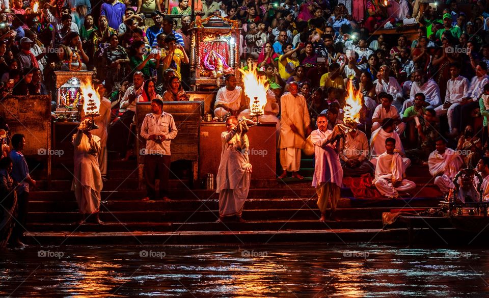 people gathered at Ganga river bank for evening prayer