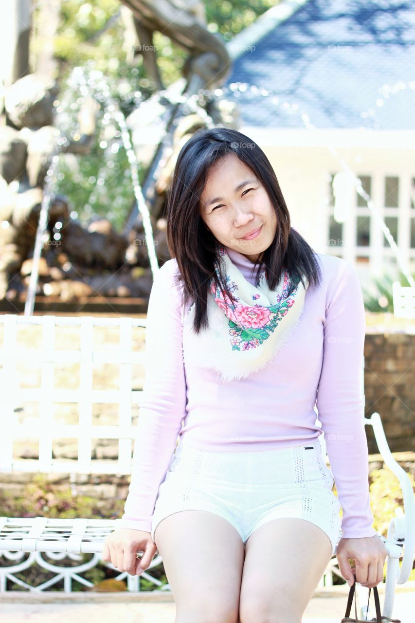 A woman smiling happiness. Fresh and bright. Portrait photography style.