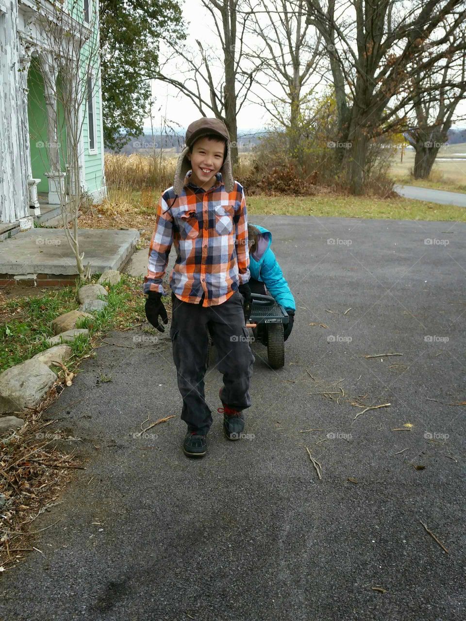 playing silly games. children enjoying the chilly days of fall