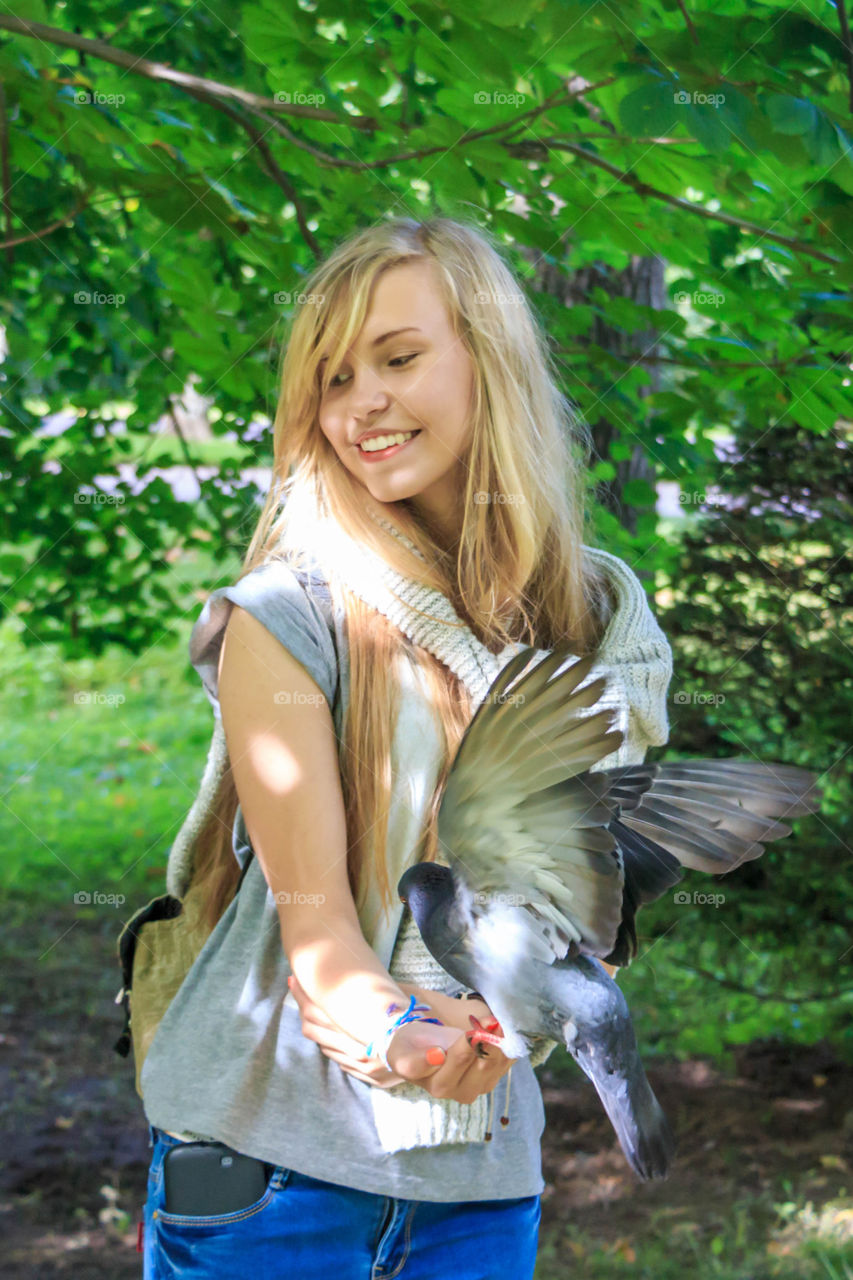 girl and pigeon