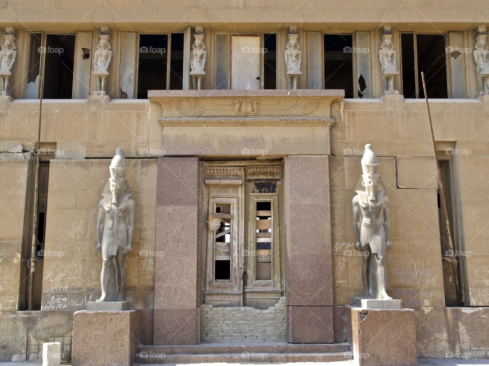 Not so ancient construction that barely survived, adjacent to the Giza pyramids. 