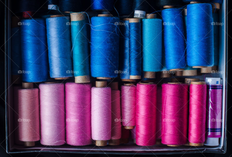 Blue and pink thread