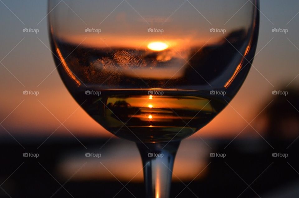 Sun setting in a glass of wine