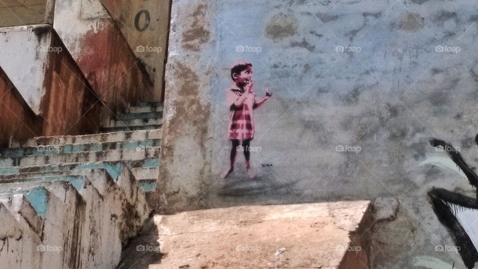 Street artist leaving traces on the Ganga...
