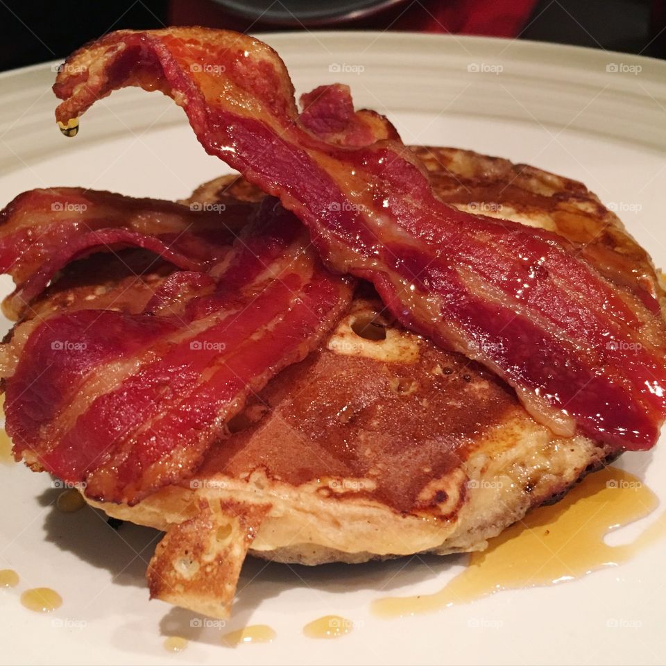 American style pancakes with bacon and maple syrup