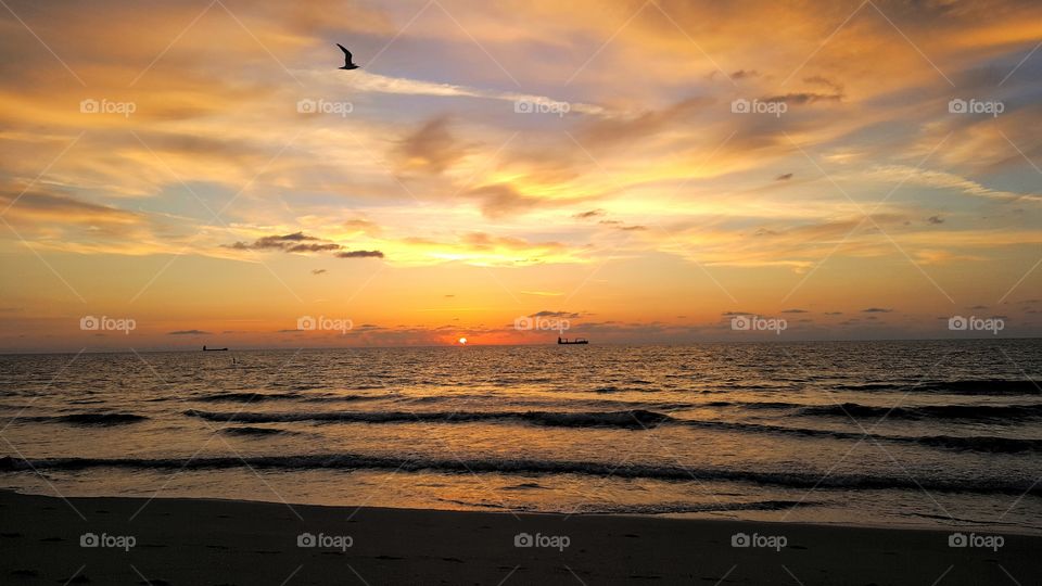 Light the Day. Daybreak from the beach in Ft. Lauderdale, FL