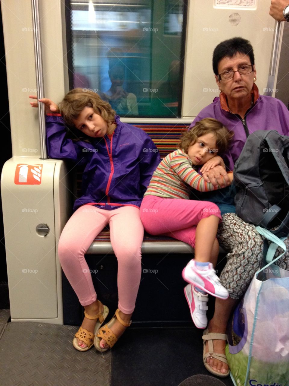 Sad children in the subway