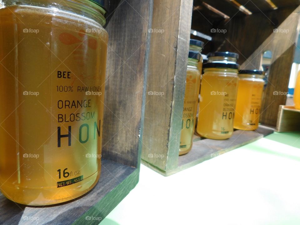 Orange honey . Orange honeybee jar 