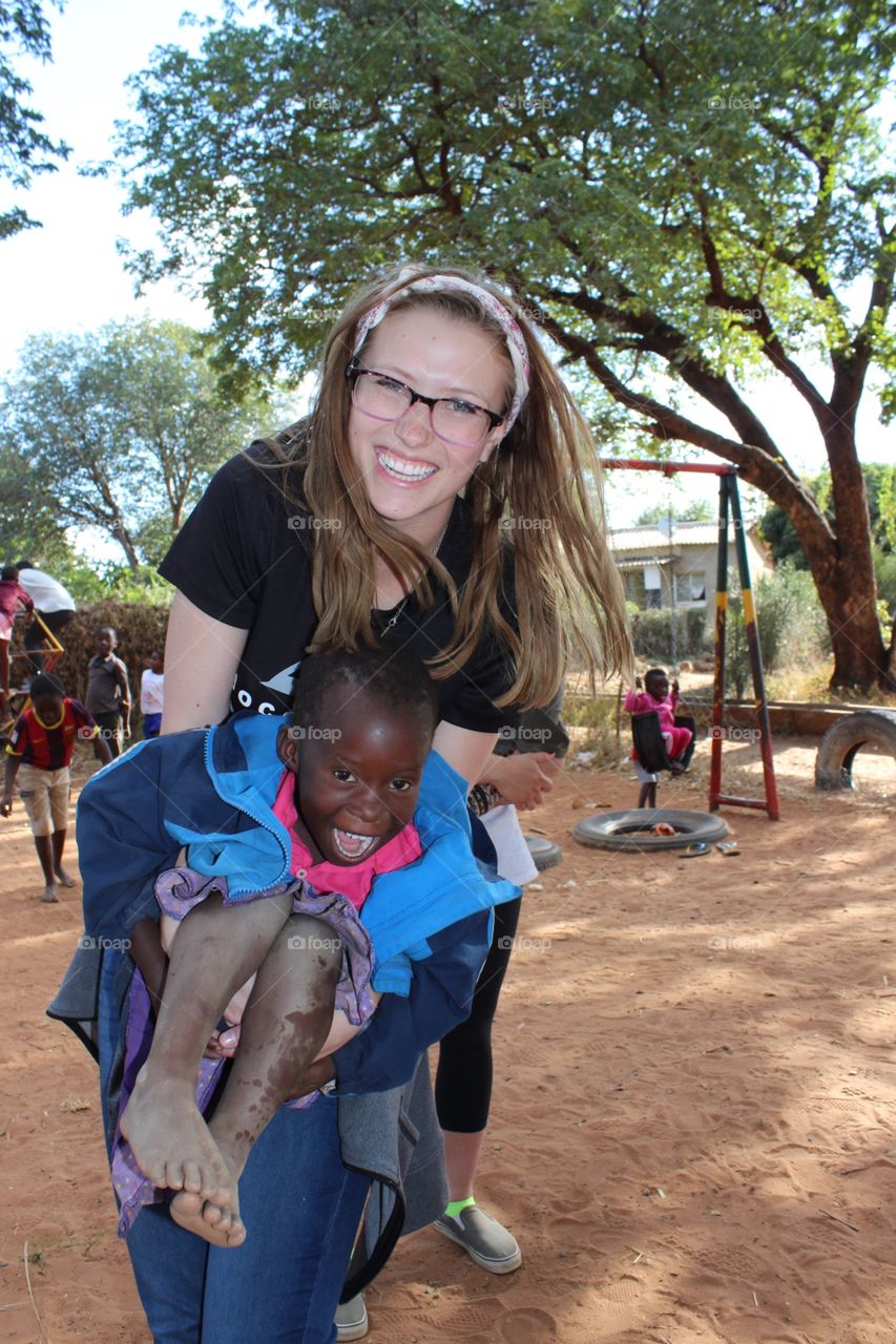 Playing with he kiddos in Africa