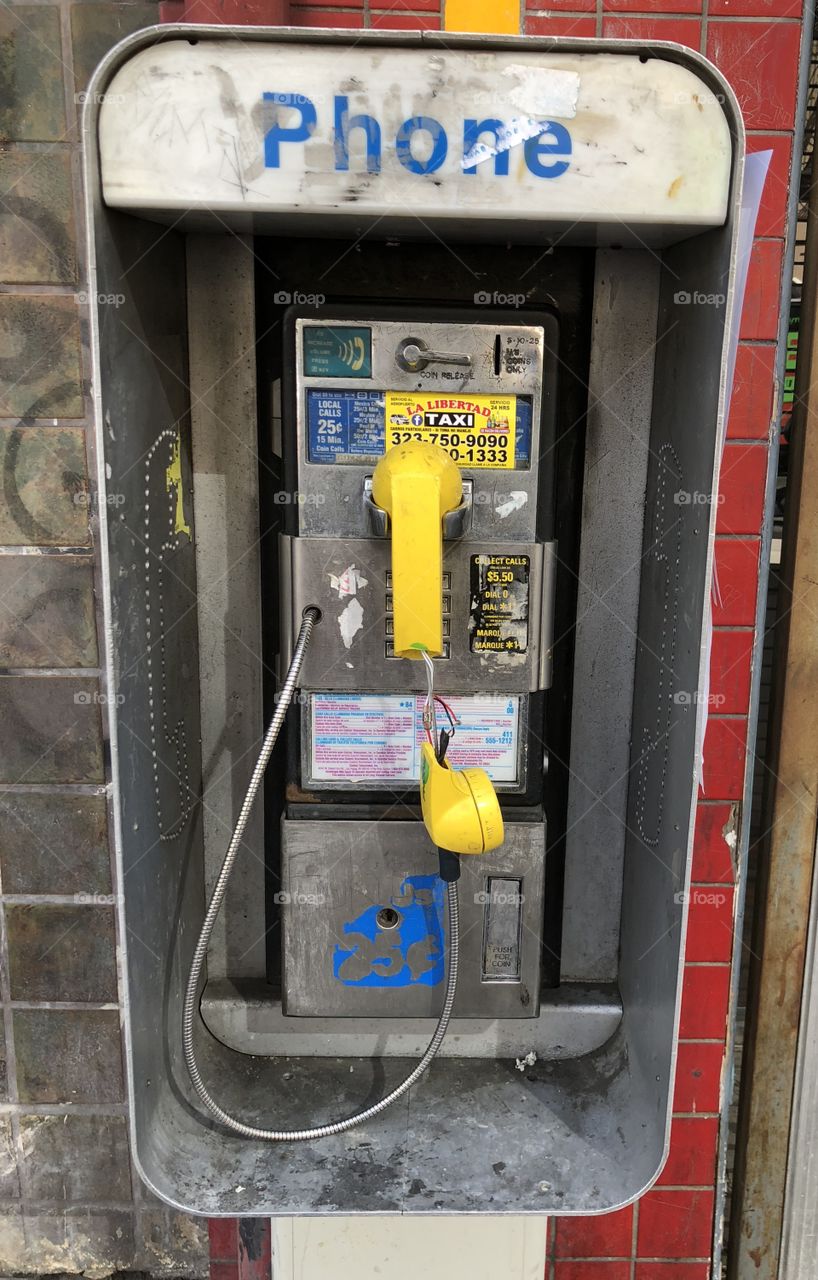 Broken pay phone near the Theater District in Downtown Los Angeles 