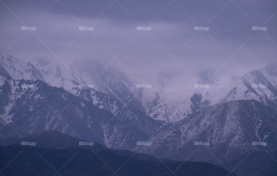 Beautiful cloudy day over Caucasus Mountains in Almaty Kazakhstan